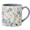 Keramiktasse mit Blumenmuster in Blau und Weiß